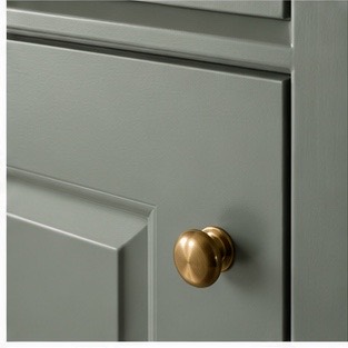 Close view of a smooth cabinet door finish