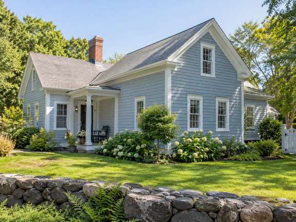 Pale blue shingle exterior with white trim — Connecticut residential design inspiration
