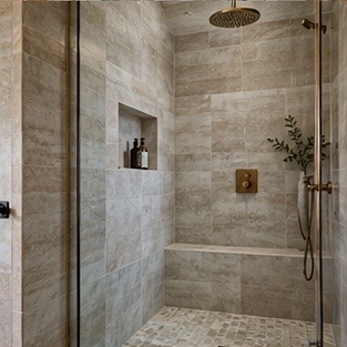 Walk-in shower with large-format wall tile